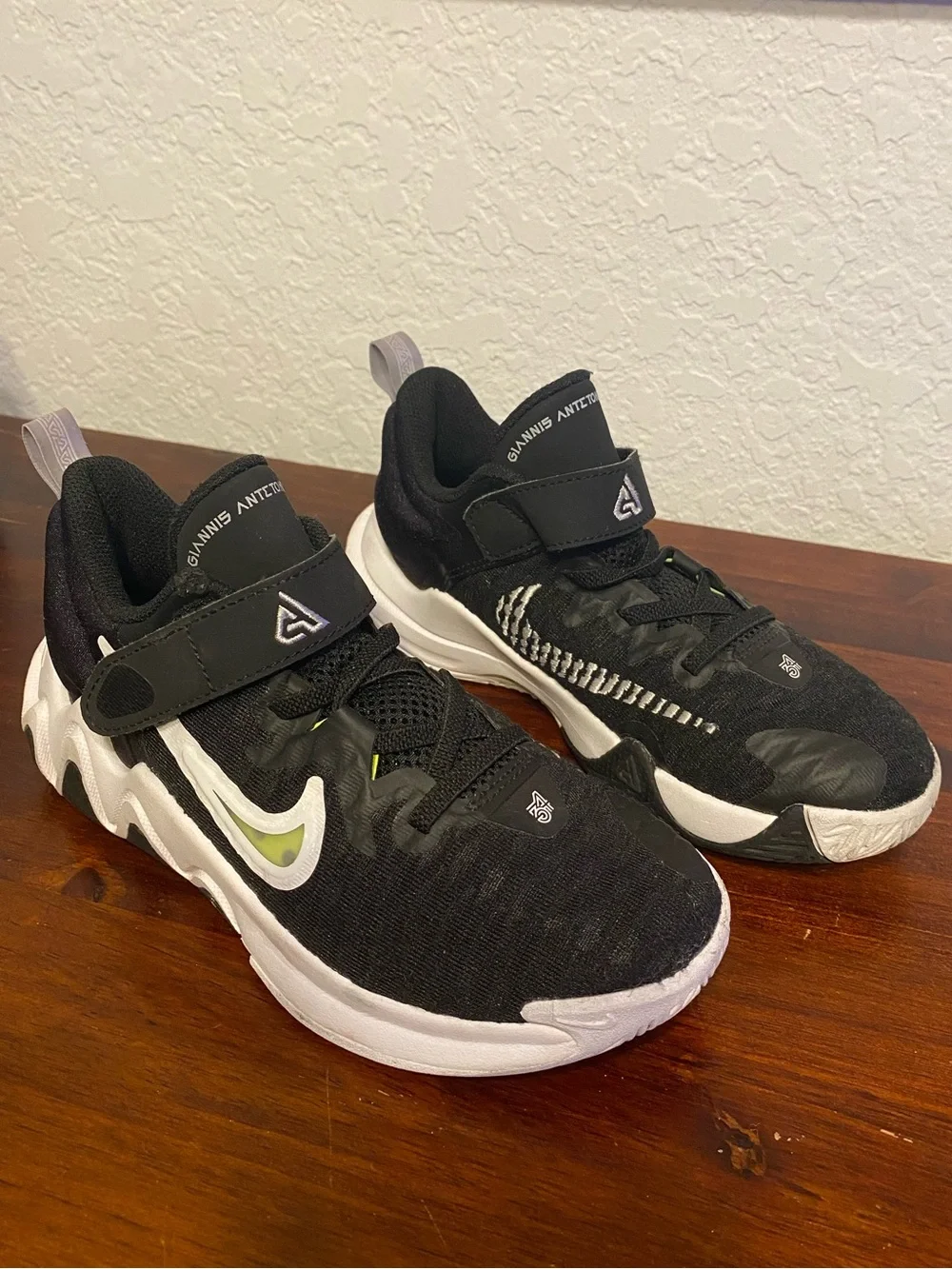 Nike Kids Black Sneakers with White Soles and Lime Accent